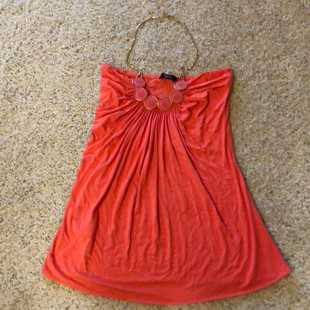 Cute shirt with gold necklace as a strap for neck